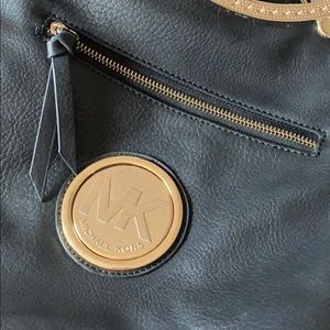 Michael Kors small to medium size Black purse